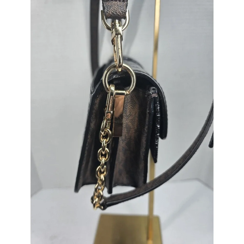 Michael Kors Greenwich medium logo-embossed patent leather shoulder bag in black